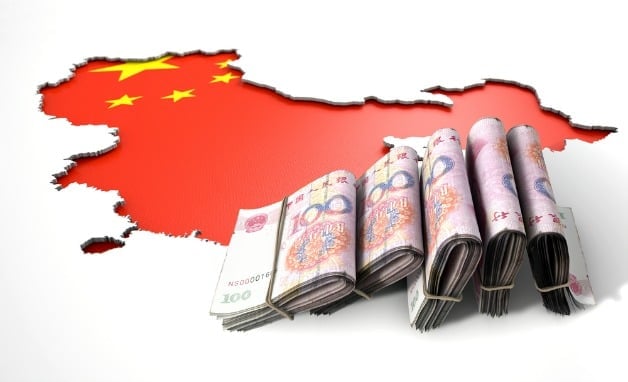 money in front of a china map graphic