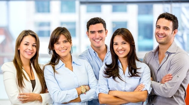 5 people with arms folded