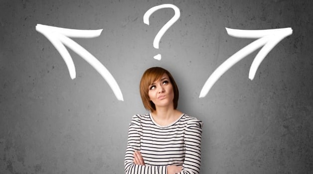 woman looking up confusingly with a question mark on top of her head