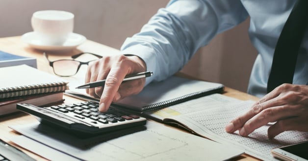 Accountant using calculator